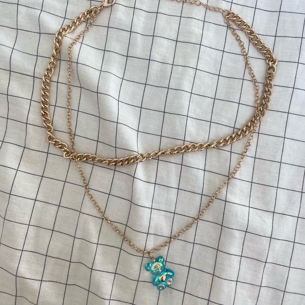 golden double chain, with blue bear